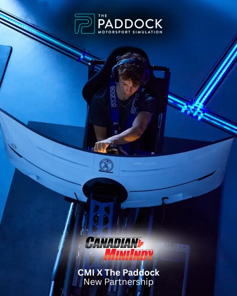 Person seated in a blue racing simulator cockpit wearing a headset, logo of The Paddock above, caption announces Canadian Minindy partnership with The Paddock.